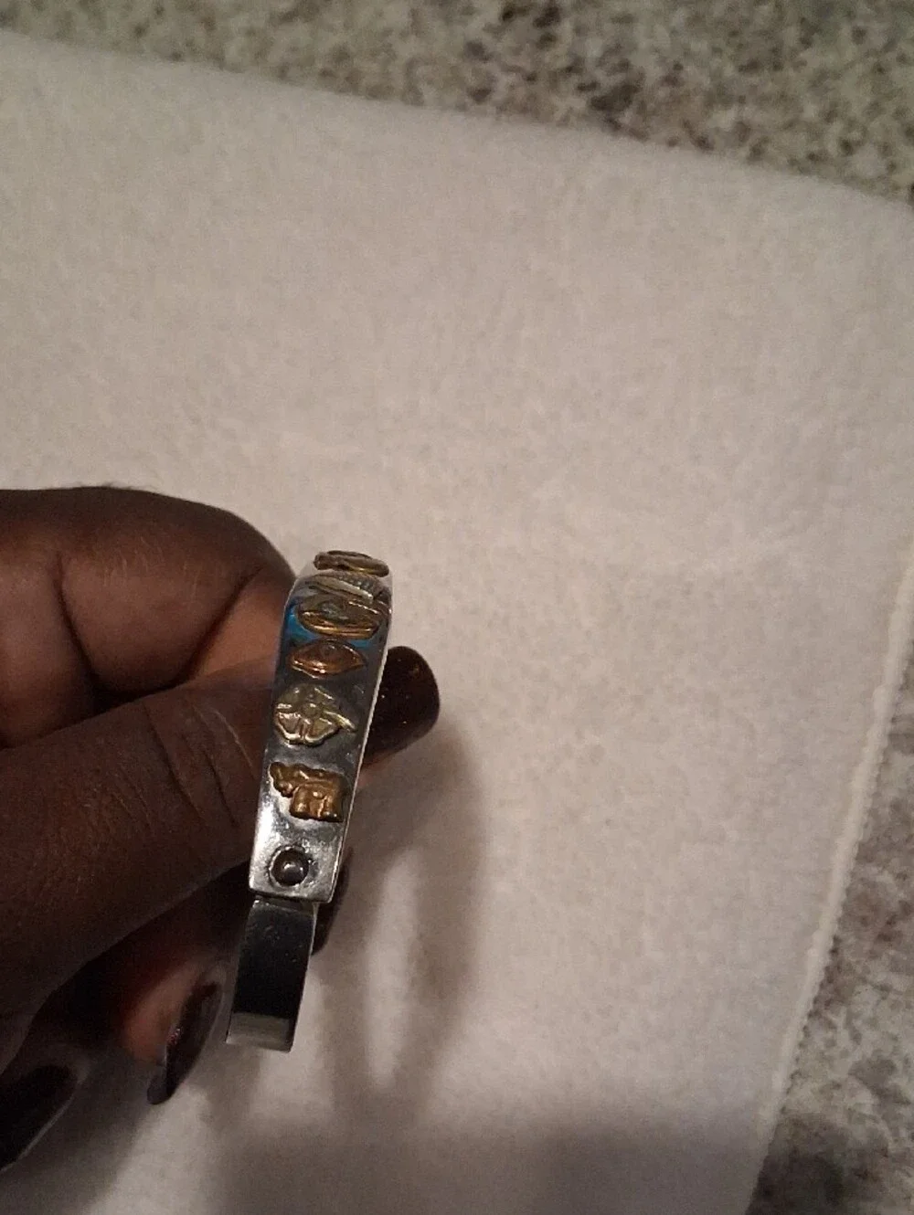 Silver-Tone Bangle Bracelet with Gold Accent Charms